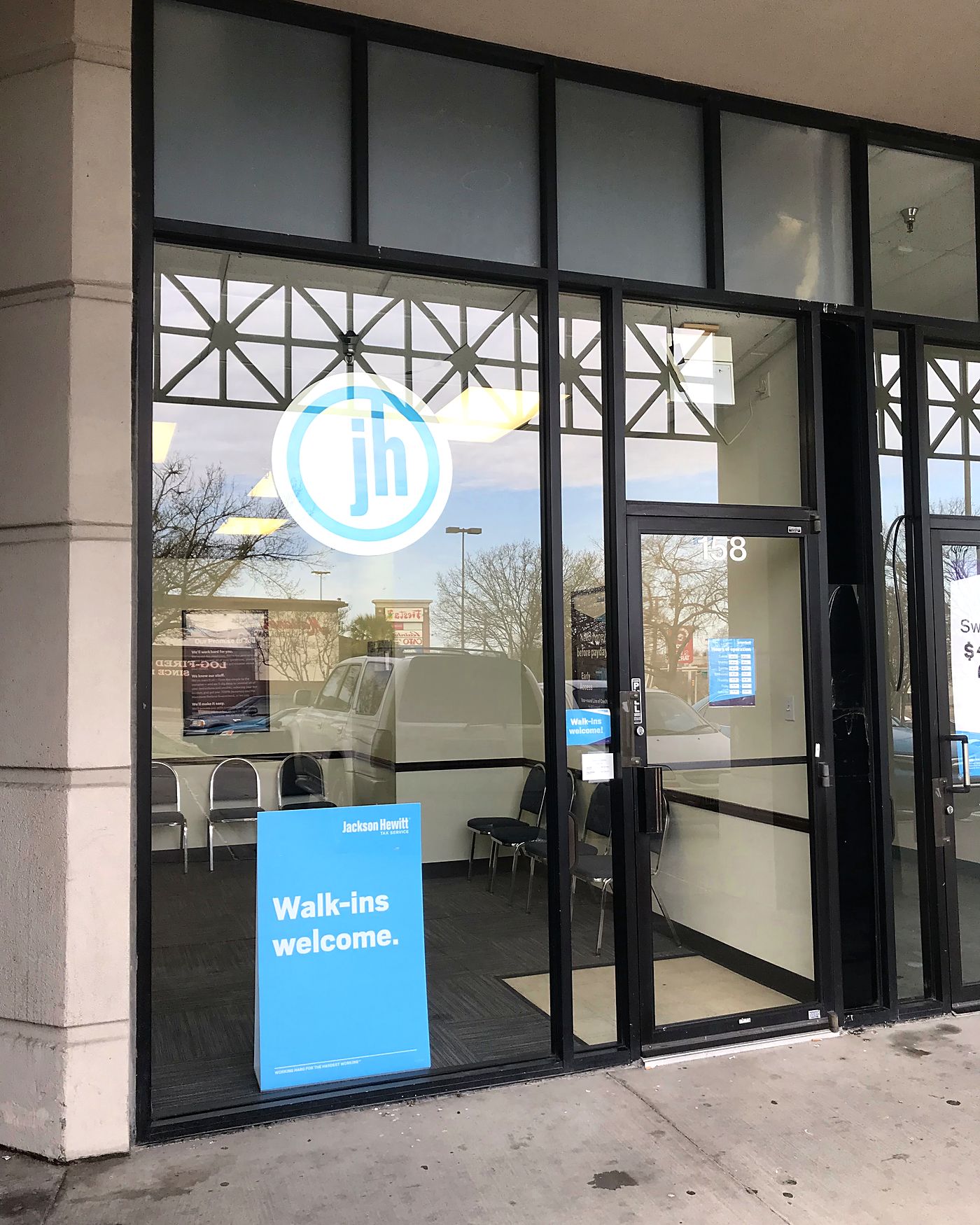 Spotless storefront glass at a local retail entrance